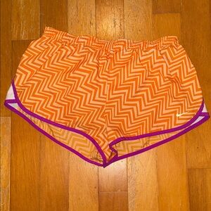 Nike Dri Fit Orange Zigzag Athletic Shorts with Purple Trim women’s Medium
